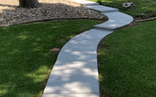 Curved Concrete Walkway to Back Door